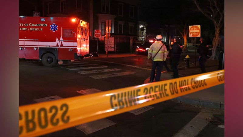Emergency personnel gather at Hope and Waterman Streets at Brown University in Providence,...