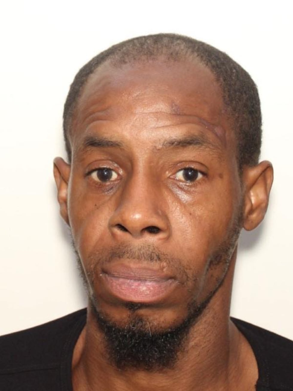 Authorities say Andrew Stapleton is armed and dangerous