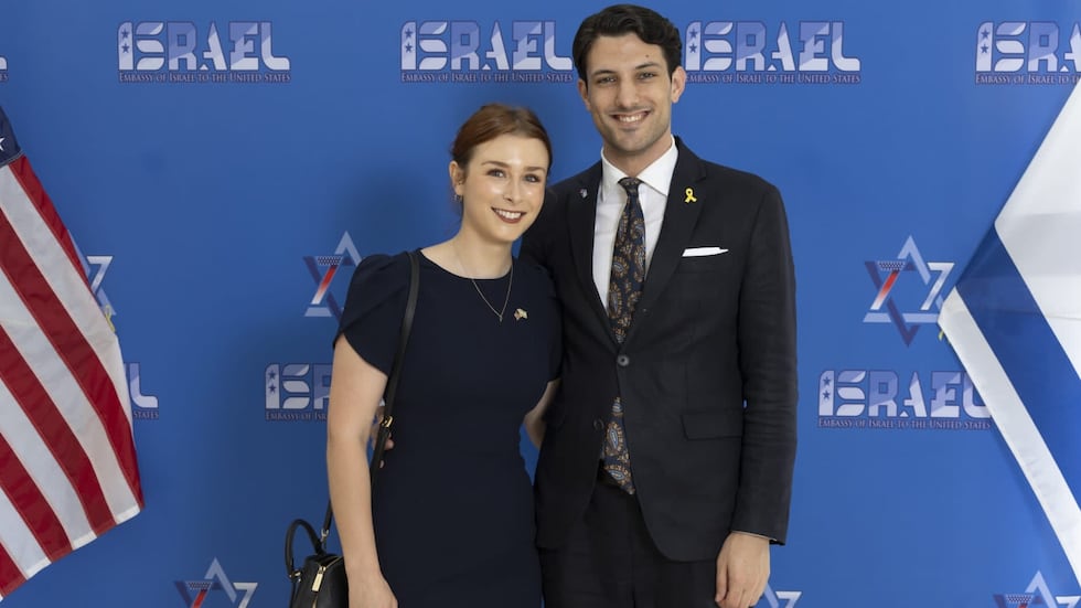 Israeli Foreign Minister Gideon Saar identified the victims as Yaron Lischinsky and Sarah...