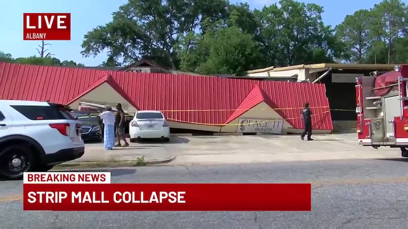 Albany strip mall collapses on vehicles parked outside