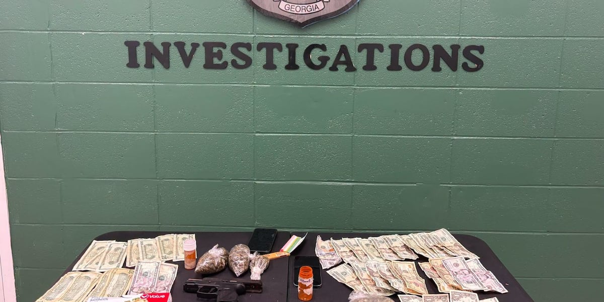 Illegal drugs, stolen firearm recovered during Dawson traffic stop, police say