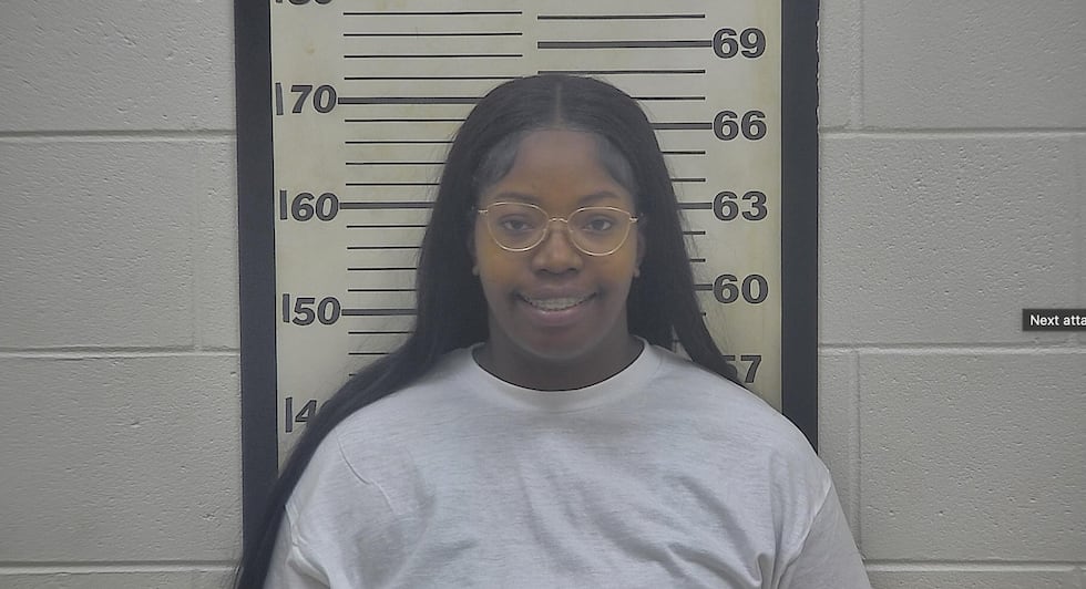 Booking records show Murphy received three separate $5,000 property bonds tied to the charges.