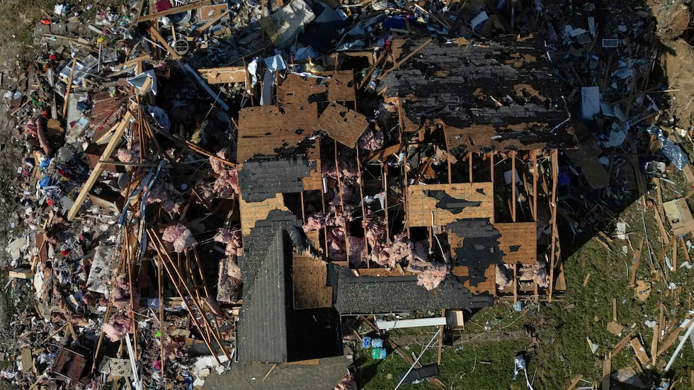 A destroyed home is seen from above, Sunday, May 18, 2025, in London, Ky., after a severe...