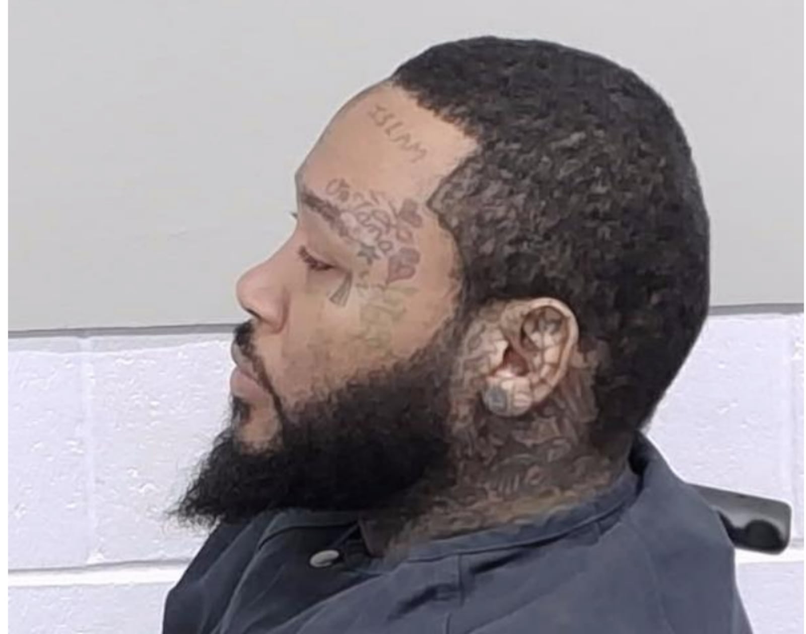 Tevin Jay Love, 32, is facing charges for allegedly beating a woman inside a Dollar General...