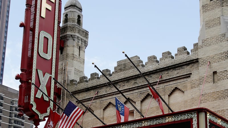 A vehicle moves past the historic Fox Theatre before, Wednesday, June 15, 2016, in Atlanta....