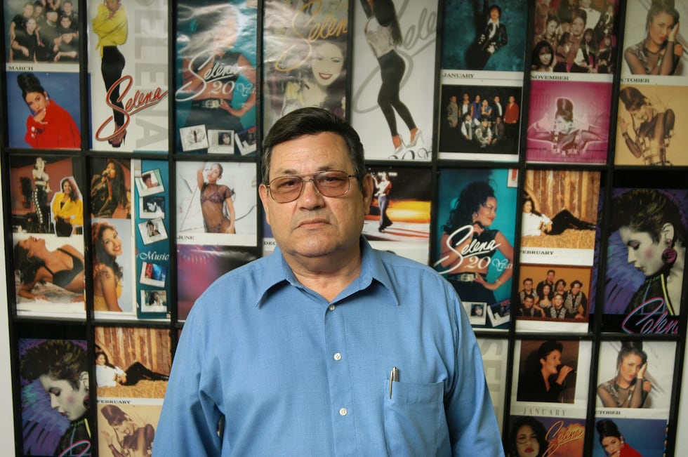 Abraham Quintanilla, father of deceased Tejano singer Selena, stands in front of a wall...