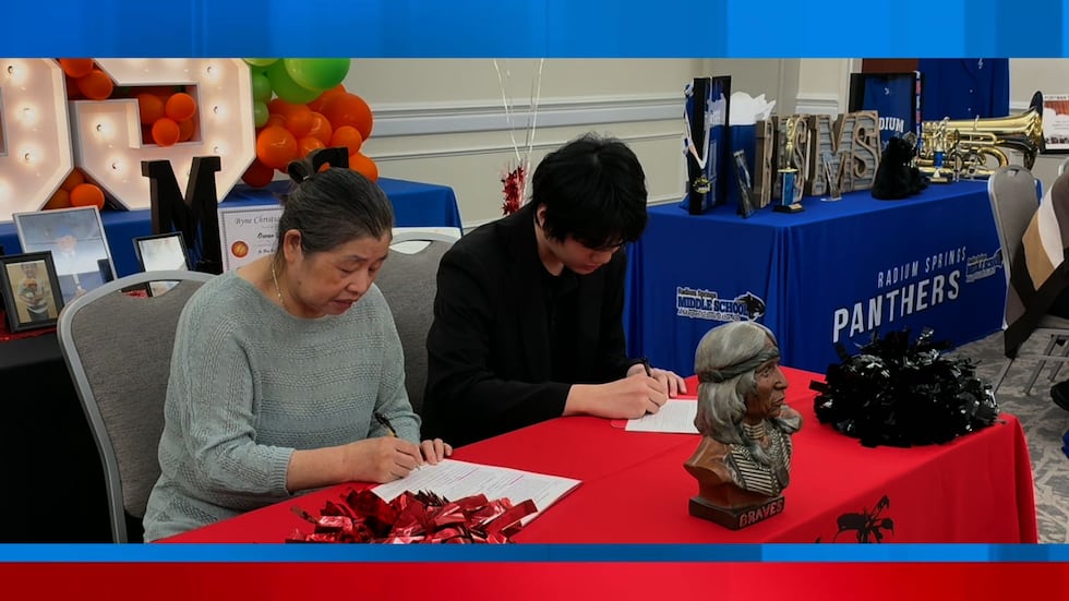 Students officially committed to the Dougherty County School System's REACH Scholarship Program.