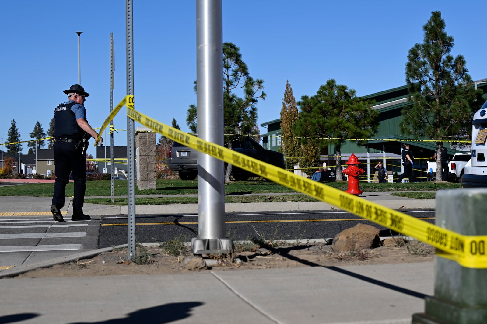 Police tape is placed outside Silver Rail Elementary school, where a shooting took place, on...