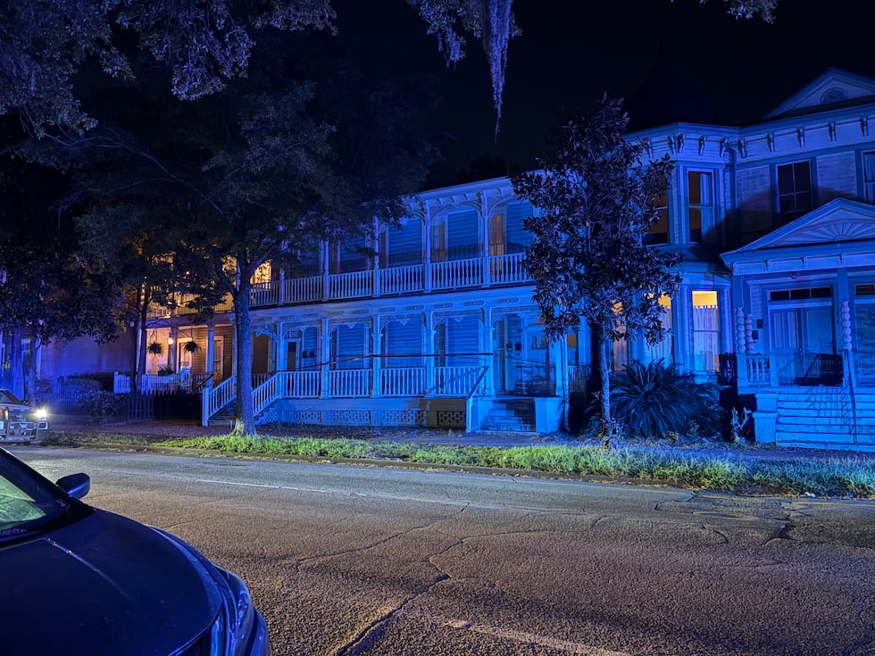 At the scene, this home is taped off, from the Henry Street side of the area.