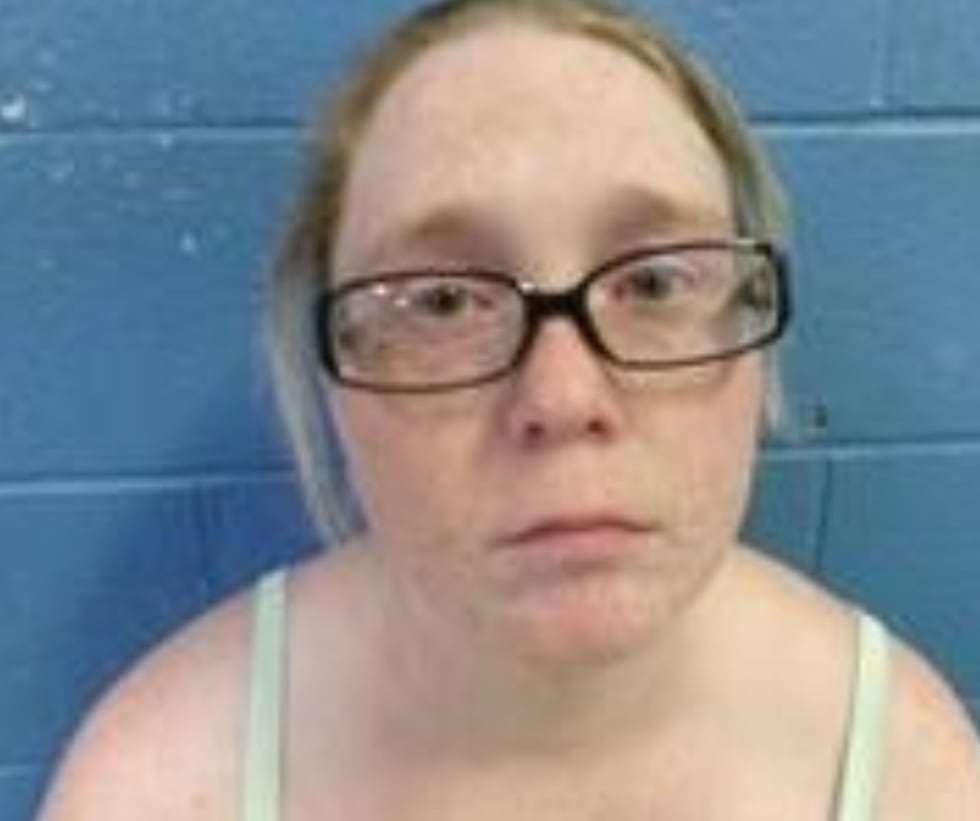 Trumann police arrested a woman and her boyfriend after finding 24 dead cats in their freezer.
