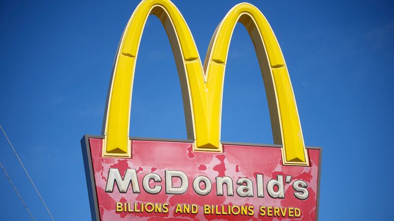 FILE - A sign with the company logo stands over a McDonald's restaurant on South Colorado...