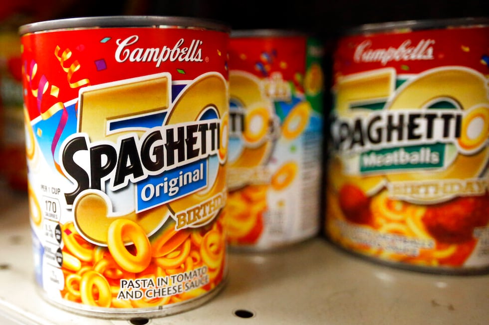 Cans of SpaghettiOs are set on the rack for sale at a store on Friday, Nov. 13, 2015, in...