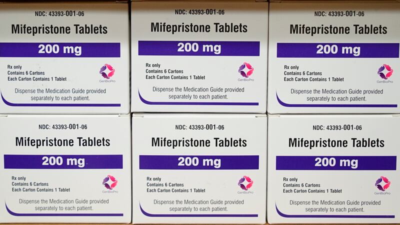 FILE - Boxes of the drug mifepristone sit on a shelf at the West Alabama Women's Center in...