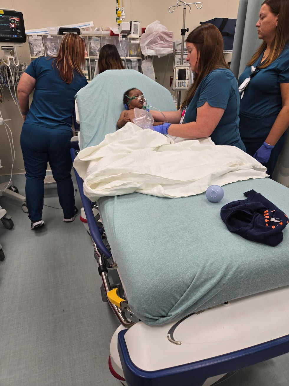 Keyng surrounded by nurses