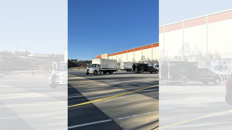 Box trucks arrived at the Fulton County elections headquarters in response to a search warrant.