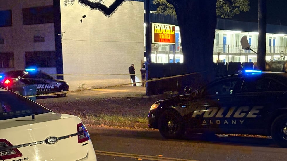 Officials are investigating after a shooting in the parking lot of the Royal Inn in Albany.