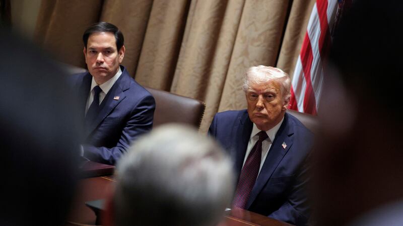 President Donald Trump, right, and Secretary of State Marco Rubio attend a cabinet meeting at...