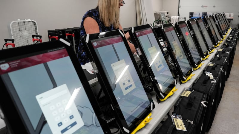 FILE - Voting machines are seen at the Bartow County Election office, Jan. 25, 2024, in...