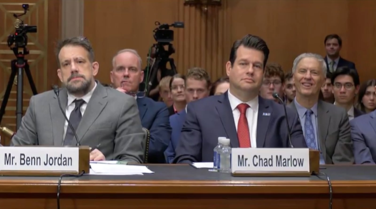 Keefe (second from left) has reported on the misuse of automated license plate readers...