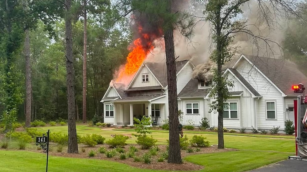 A Grady County Home caught fire after neighbor's saw lightning in the Beachton Ridge area