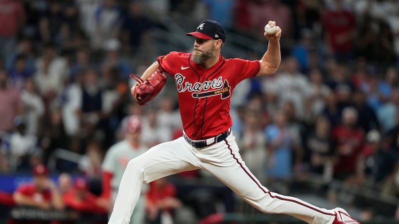 Atlanta Braves pitcher Chris Sale throws against the Philadelphia Phillies in the eighth...