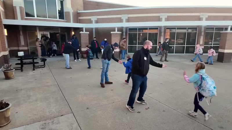 A monthly tradition at an elementary school is giving students a spirited start to the day,...