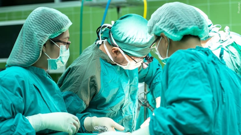 Doctors performing surgery