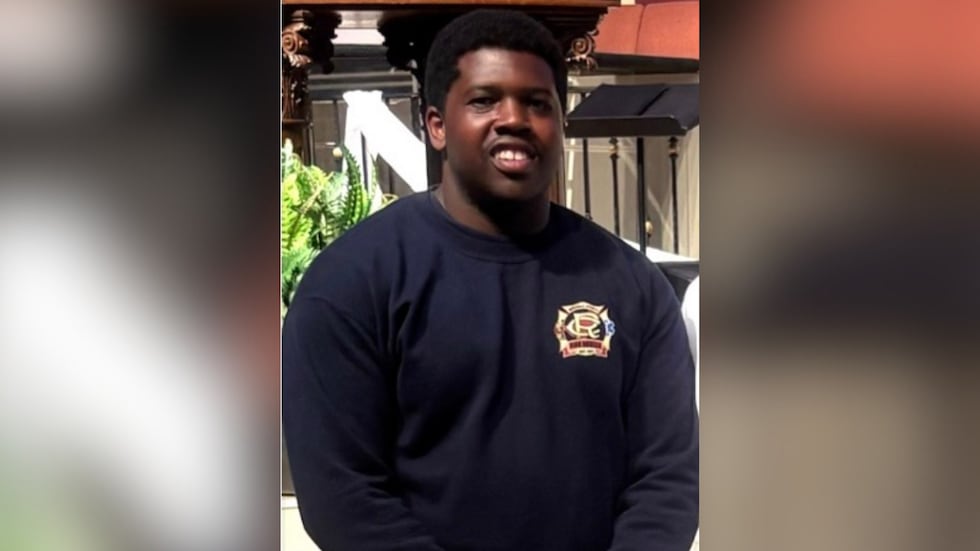Firefighter Juan Antonia Smith II was killed Friday in a rollover accident in Rockdale County.
