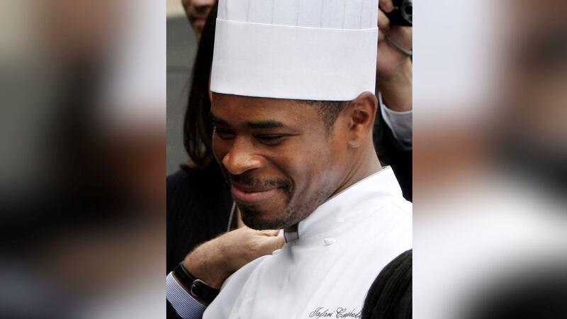 FILE - White House Chef Tafari Campbell smiles, Nov. 6, 2008, on the South Lawn of the White...