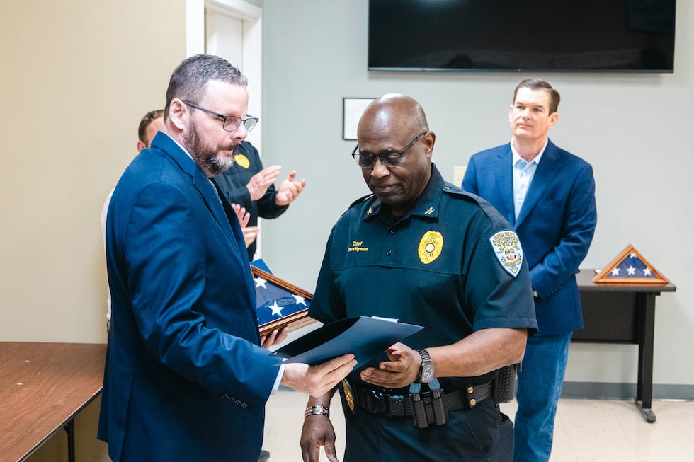 Chief Steve Hyman presented a promotion to Detective Jerry Fulford