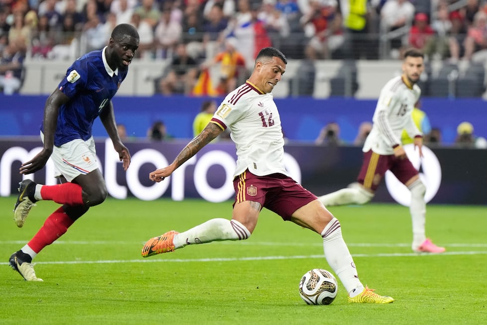 Spain's Pedro Porro scores his side's second goal during the World Cup semifinal soccer match...