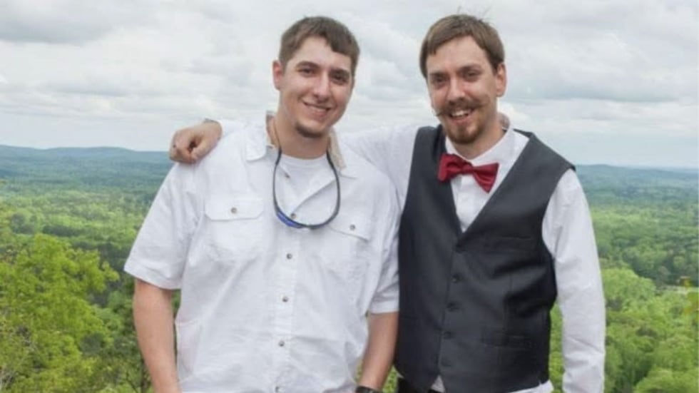 Lorne Odom (left) poses with his brother, Ryan Odom (right).