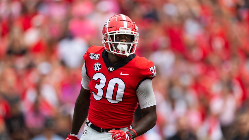 FILE - Georgia linebacker Tae Crowder looks over the offensive lineup of Arkansas State during...