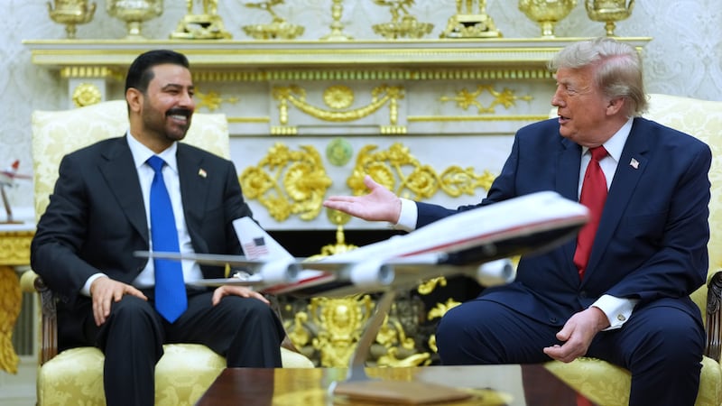President Donald Trump meets with Iraq's Prime Minister Ali al-Zaidi in the Oval Office of the...