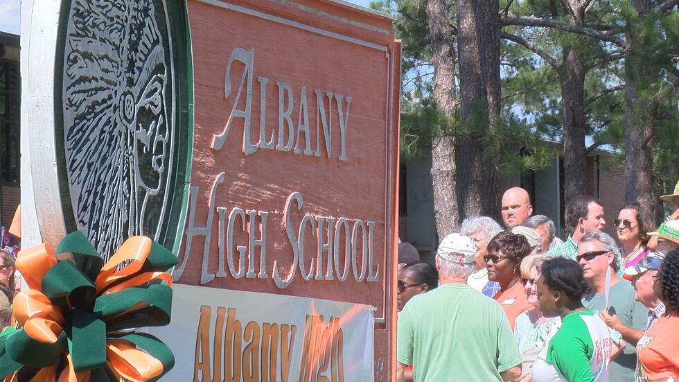 Several alumni said they wanted to organize a picture day before the school's sign is removed....