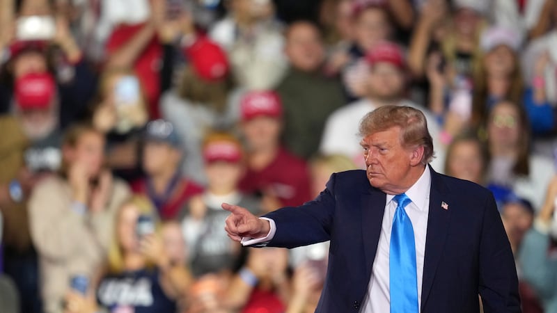 President Donald Trump departs a campaign rally at Truist Arena, Saturday, Oct. 17, 2026, in...