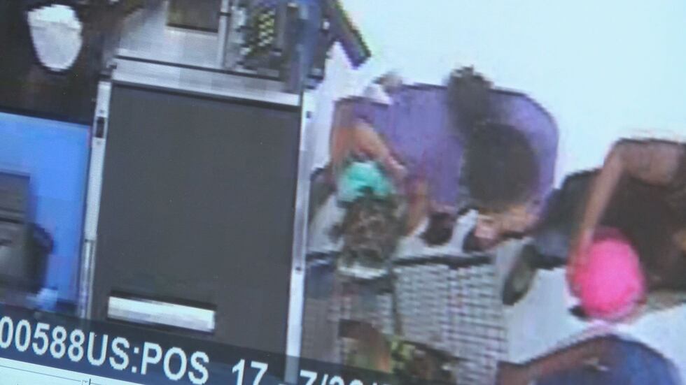 Video footage shows three people, one woman and two men, investigators say used the fake...