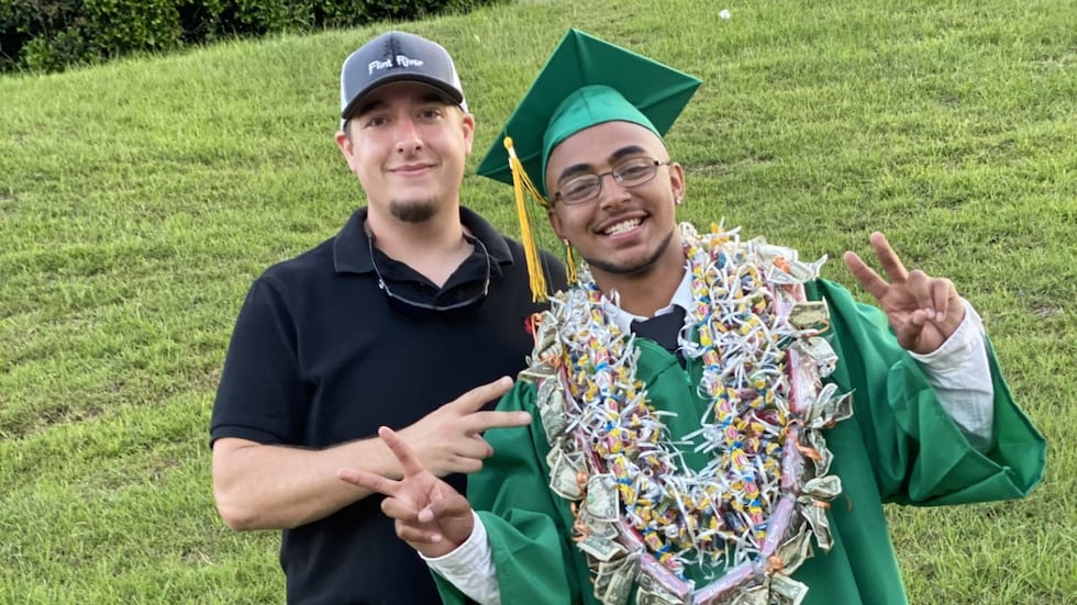 Lorne Odom (left) poses with his friend, Steven Buffi (right).