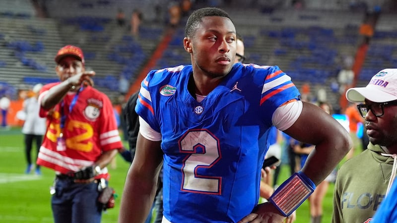 Florida quarterback DJ Lagway (2) leave the field after losing to Tennessee in an NCAA college...