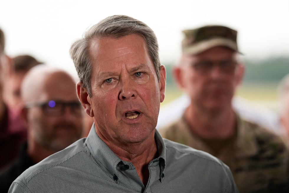 Gov. Brian Kemp speaks on the fires in Southeast Georgia, Friday, April 24, 2026, in Waycross,...