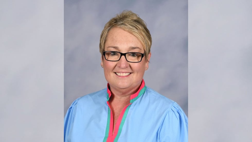 Noel Giles surprised with A+ Educator award after 35 years in education