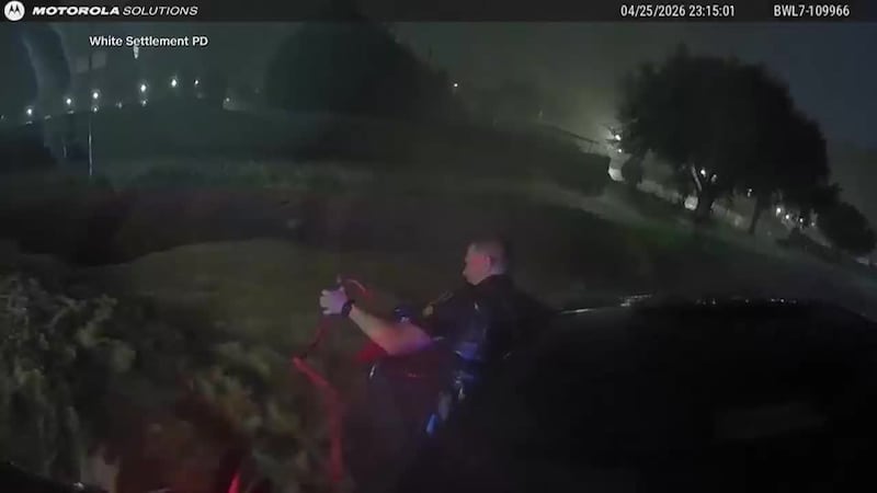 Police used jumper cables as a an improvised lifeline to save a mother from raging...
