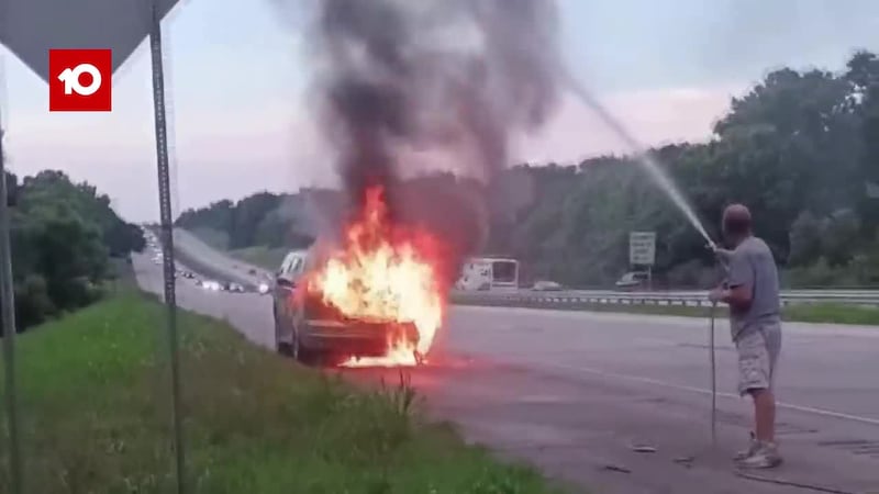 WATCH: Albany man stops help extinguish car fire on I-75 before firefighters arrive